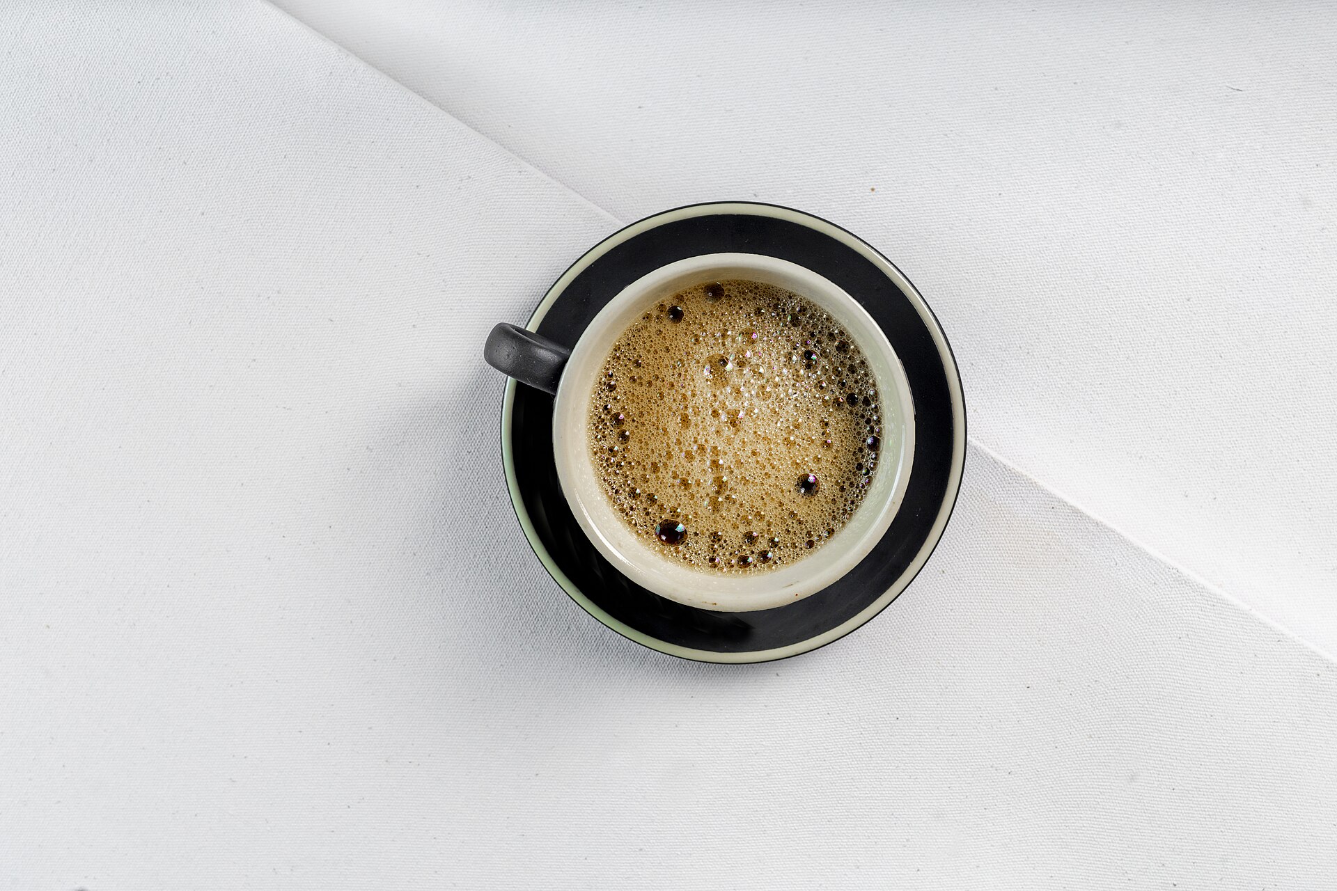 A cup of espresso on a table